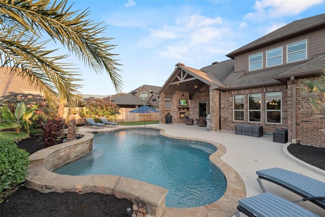 view of pool featuring a fenced in pool, a patio, and fence