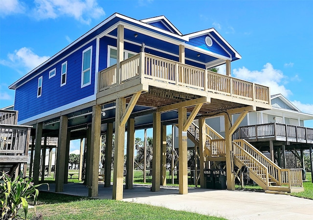 rear view of house with stairway