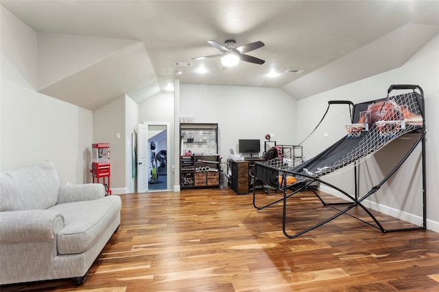 interior space featuring vaulted ceiling, visible vents, and light wood-type flooring