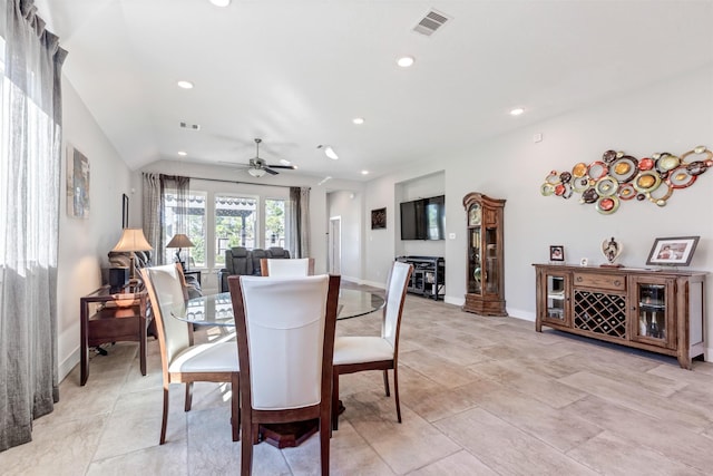 dining space with recessed lighting, visible vents, baseboards, and vaulted ceiling