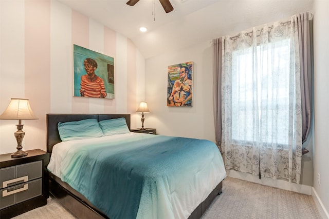 carpeted bedroom with lofted ceiling, recessed lighting, baseboards, and ceiling fan