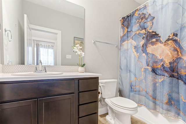 bathroom featuring vanity, toilet, tasteful backsplash, and shower / tub combo with curtain