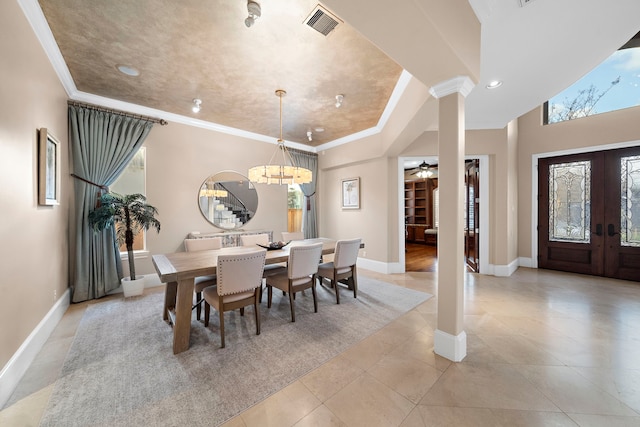 dining room with baseboards, visible vents, decorative columns, ornamental molding, and french doors