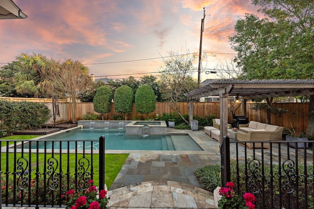 pool at dusk featuring a patio, a fenced backyard, a pergola, a pool with connected hot tub, and outdoor lounge area