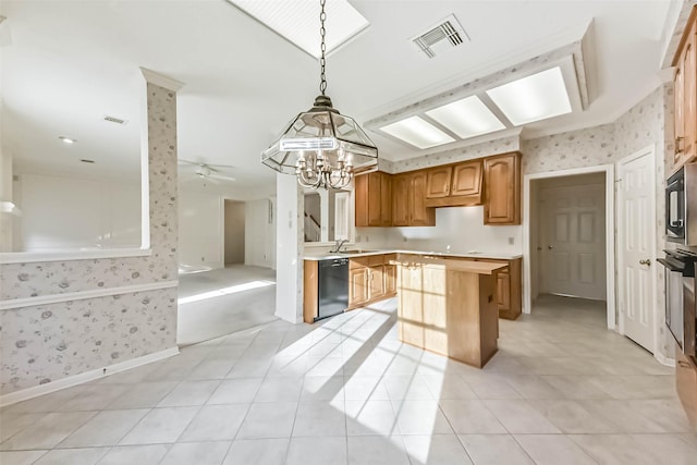 kitchen featuring wallpapered walls, black dishwasher, visible vents, and a kitchen island