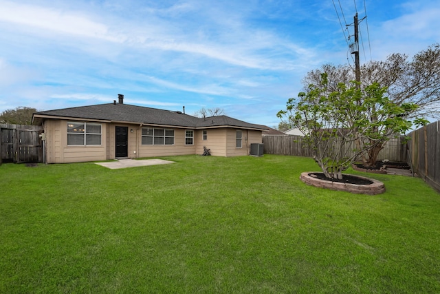 back of house with a patio, cooling unit, a fenced backyard, and a lawn