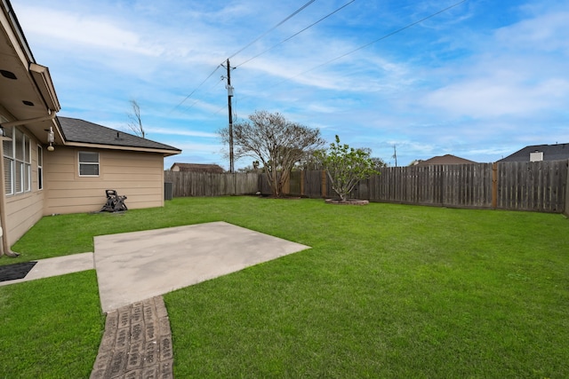 rear view of property with a yard, a patio, central AC, and a fenced backyard