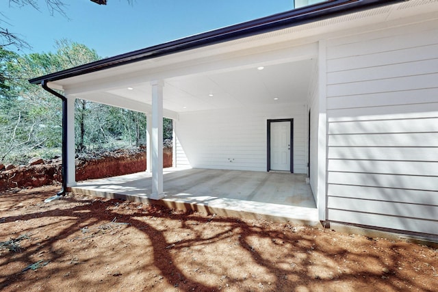 view of patio featuring a porch