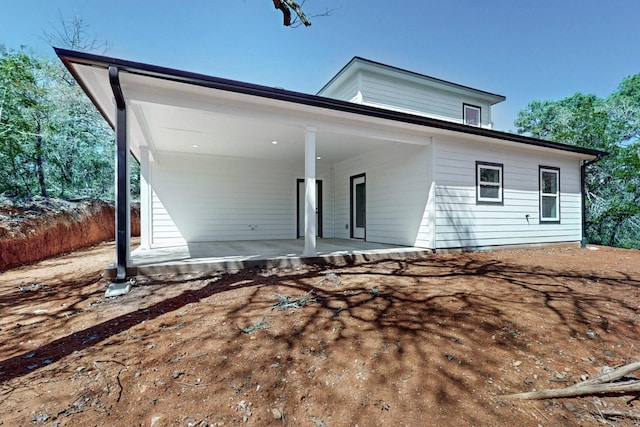 view of front of property featuring a patio