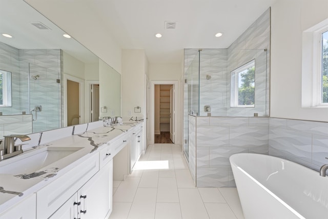 full bathroom featuring a sink, visible vents, and a shower stall