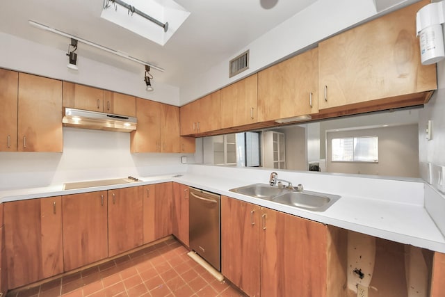 kitchen featuring a sink, light countertops, under cabinet range hood, stainless steel dishwasher, and black electric stovetop