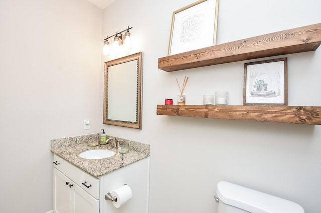 half bath with toilet and vanity