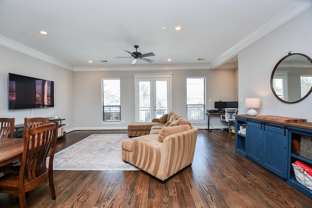 living room with dark wood-type flooring, baseboards, ornamental molding, recessed lighting, and french doors