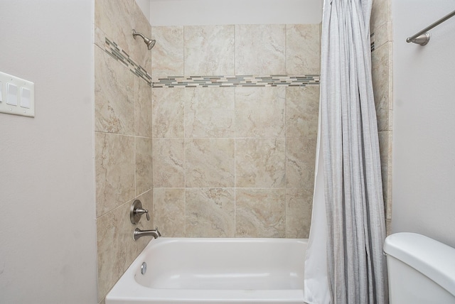 bathroom with toilet and shower / bathtub combination with curtain