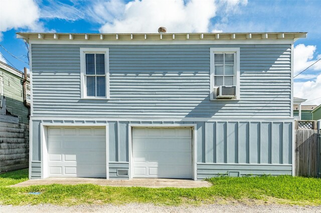 exterior space with cooling unit and fence