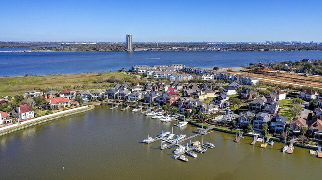 aerial view featuring a residential view and a water view