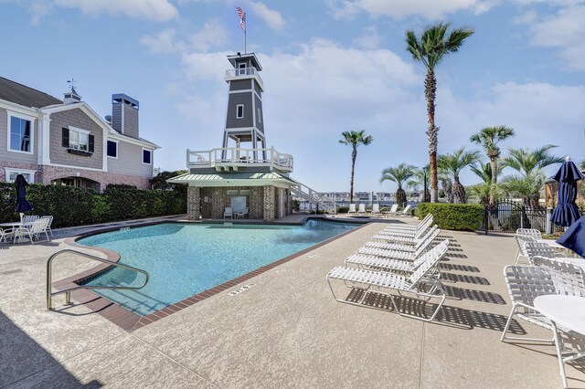 pool featuring a patio area