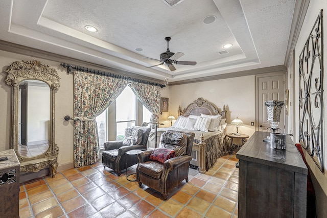 bedroom with a raised ceiling, a textured ceiling, ceiling fan, and crown molding