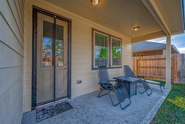 view of patio with fence