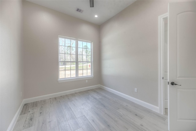 spare room featuring recessed lighting, visible vents, baseboards, and light wood finished floors