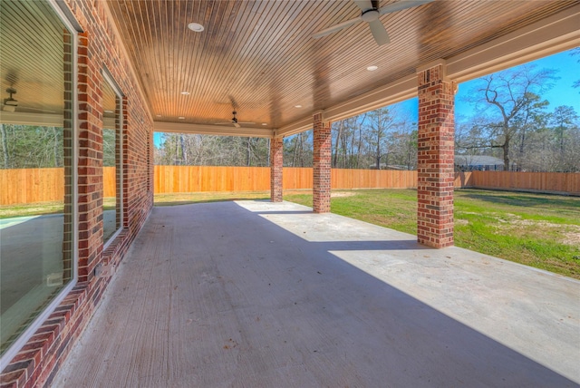 view of patio with a ceiling fan and a fenced backyard