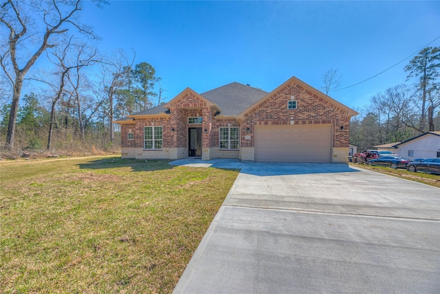 view of front of property with brick siding, a front lawn, roof with shingles, driveway, and an attached garage