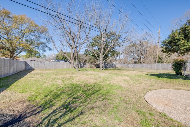 view of yard featuring a fenced backyard