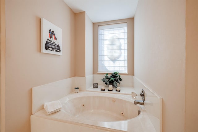 bathroom with a jetted tub