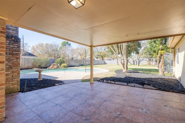 view of patio / terrace with a fenced in pool and a fenced backyard