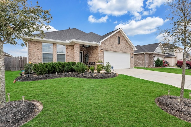 ranch-style home with a garage, brick siding, concrete driveway, and fence