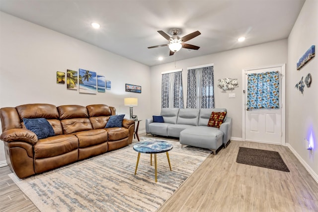 living room with recessed lighting, wood finished floors, baseboards, and ceiling fan