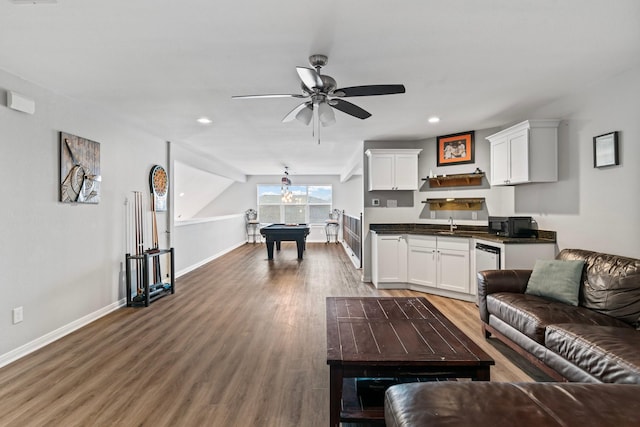 living room featuring wood finished floors, baseboards, a ceiling fan, recessed lighting, and pool table