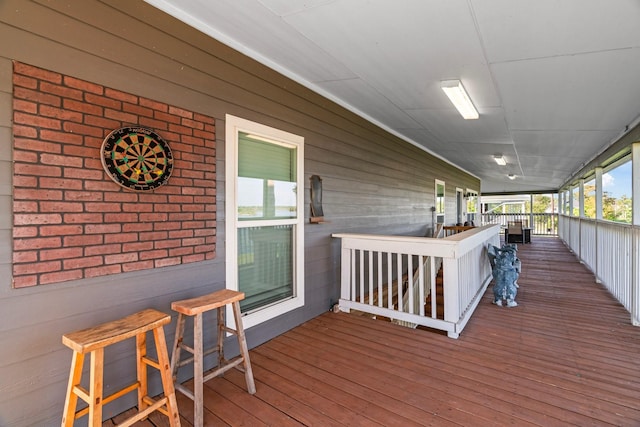 wooden terrace with covered porch