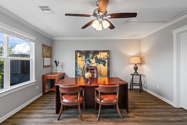 dining area with dark wood finished floors, visible vents, and ornamental molding