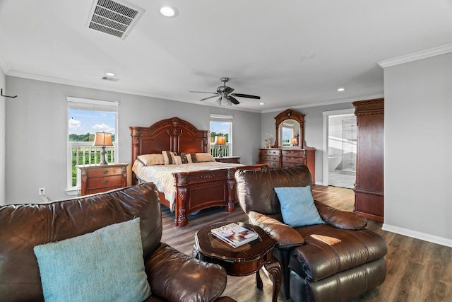 bedroom featuring recessed lighting, visible vents, wood finished floors, and ornamental molding