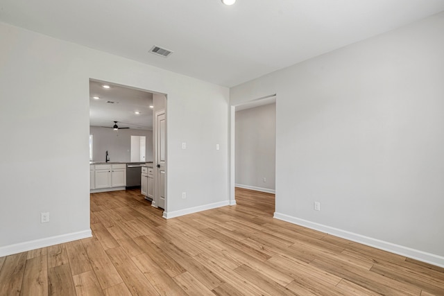 unfurnished living room featuring visible vents, baseboards, recessed lighting, ceiling fan, and light wood-style floors