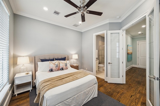 bedroom with visible vents, wood finished floors, french doors, crown molding, and baseboards