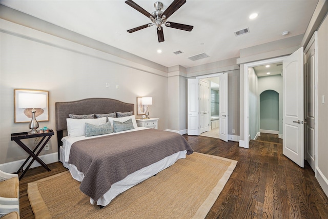 bedroom with recessed lighting, visible vents, baseboards, and wood finished floors