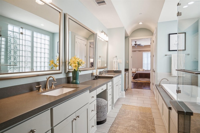 full bath featuring visible vents, connected bathroom, tile patterned flooring, ceiling fan, and vanity