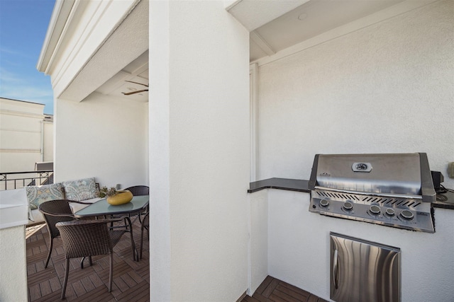 view of patio / terrace featuring exterior kitchen and grilling area