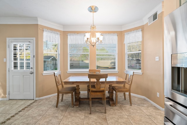 dining area with light tile patterned floors, visible vents, an inviting chandelier, and crown molding