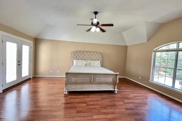 bedroom with access to outside, dark wood-style floors, baseboards, ceiling fan, and vaulted ceiling