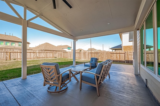 view of patio / terrace featuring an outdoor living space and a fenced backyard