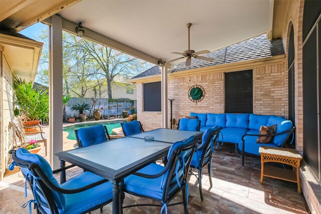 view of patio with outdoor dining space, fence, a fenced in pool, an outdoor living space, and ceiling fan