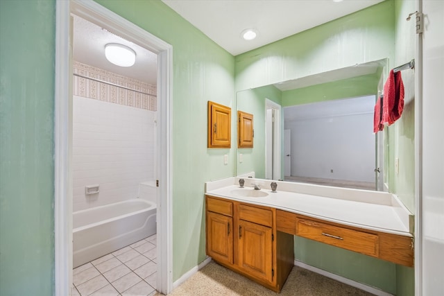 bathroom with tile patterned floors, shower / washtub combination, vanity, and baseboards