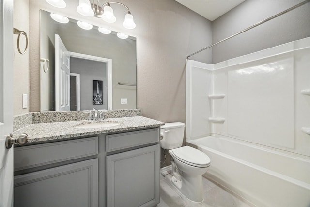 bathroom with tile patterned flooring, toilet, vanity, and shower / tub combination