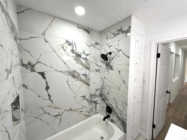318 S Fulton St, Texas City, TX 77591 - full bathroom featuring shower / bathing tub combination and wood finished floors
