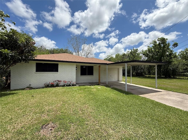 318 S Fulton St, Texas City, TX 77591 - ranch-style house with a garage, concrete driveway, a front lawn, and brick siding