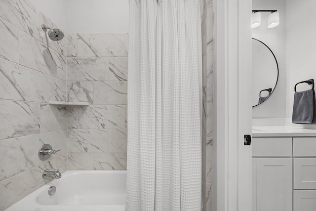 bathroom featuring vanity and shower / bath combo