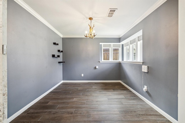 unfurnished dining area featuring wood finished floors, visible vents, baseboards, crown molding, and a chandelier